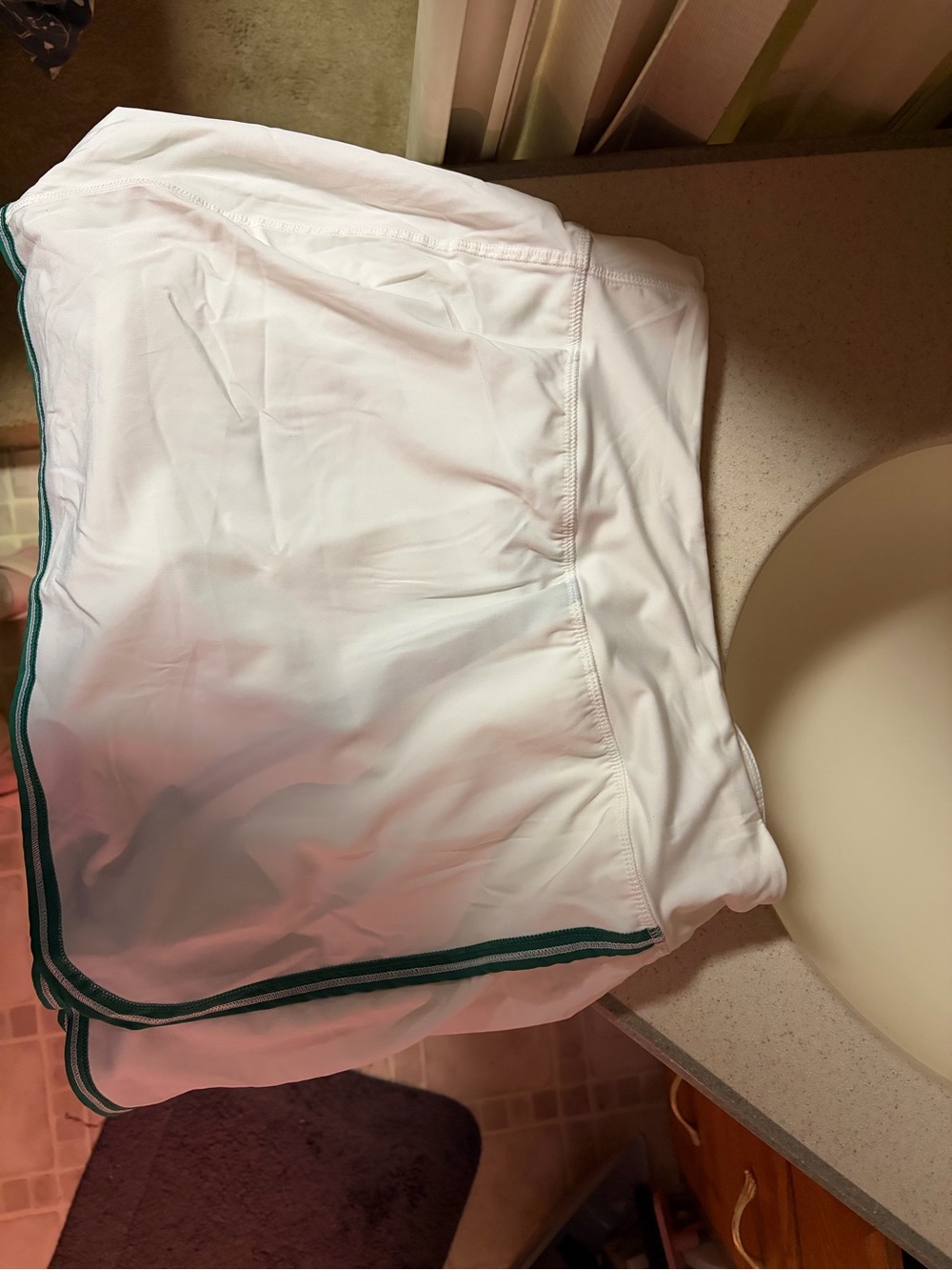 Crane skort size small. White and green